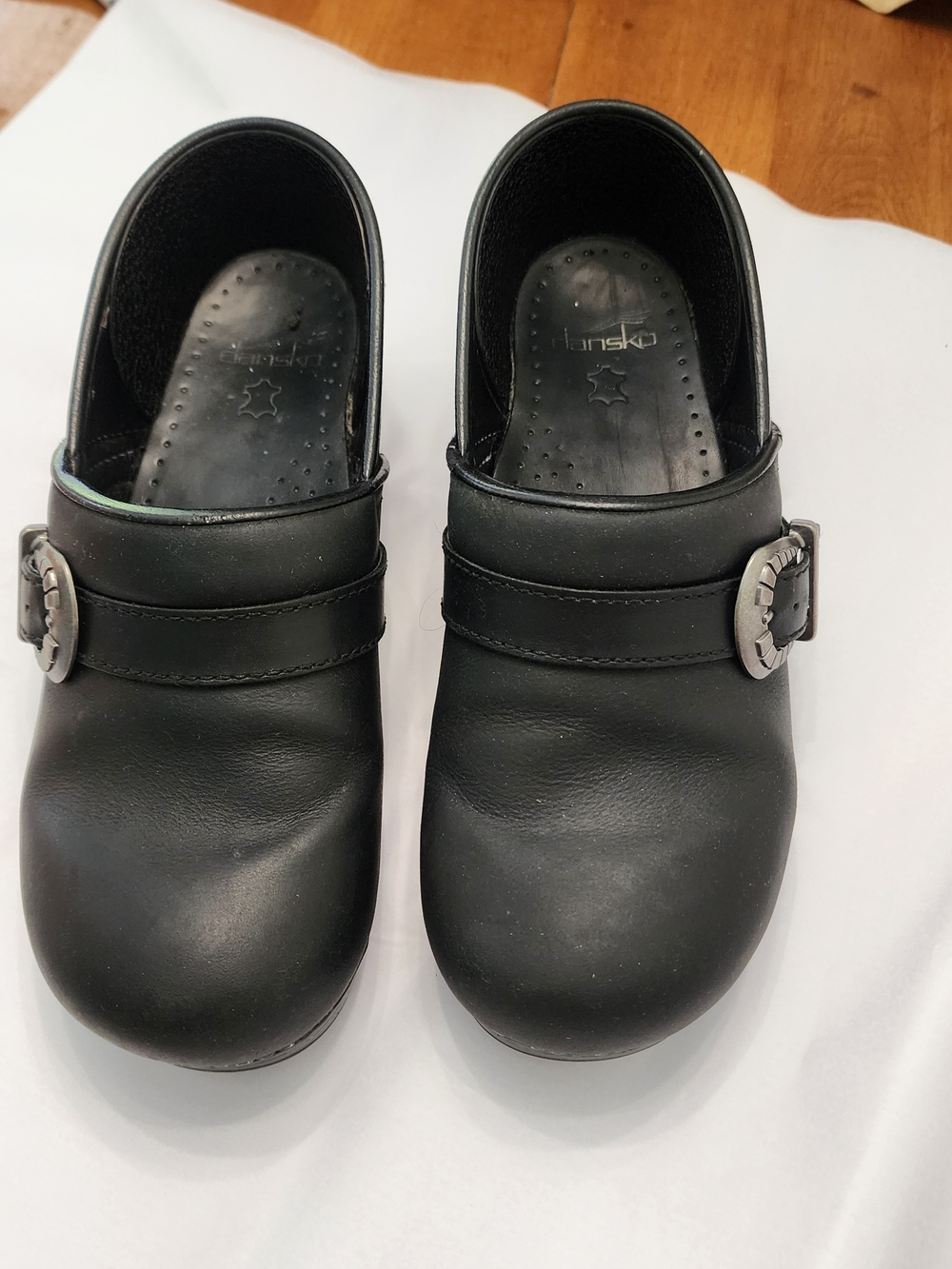 Dansko Black Leather Slip-On Clog with Embossed Insole